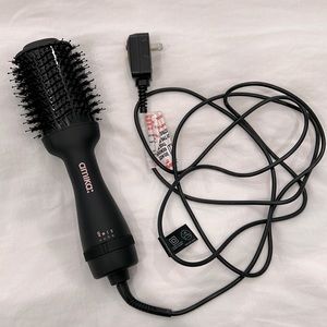 Amika hair dryer brush in excellent condition